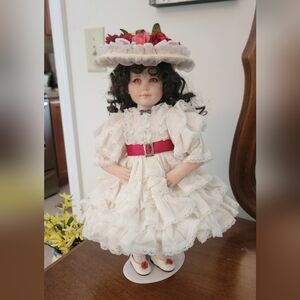 Franklin Mint Cream Doll with Red Ribbon